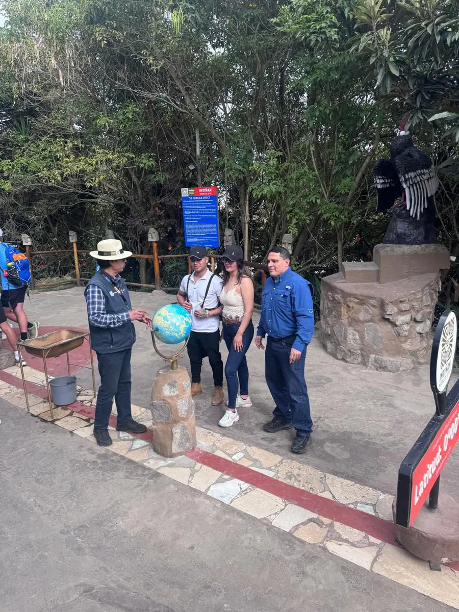 Juan Carlos guiding a group at the equator line